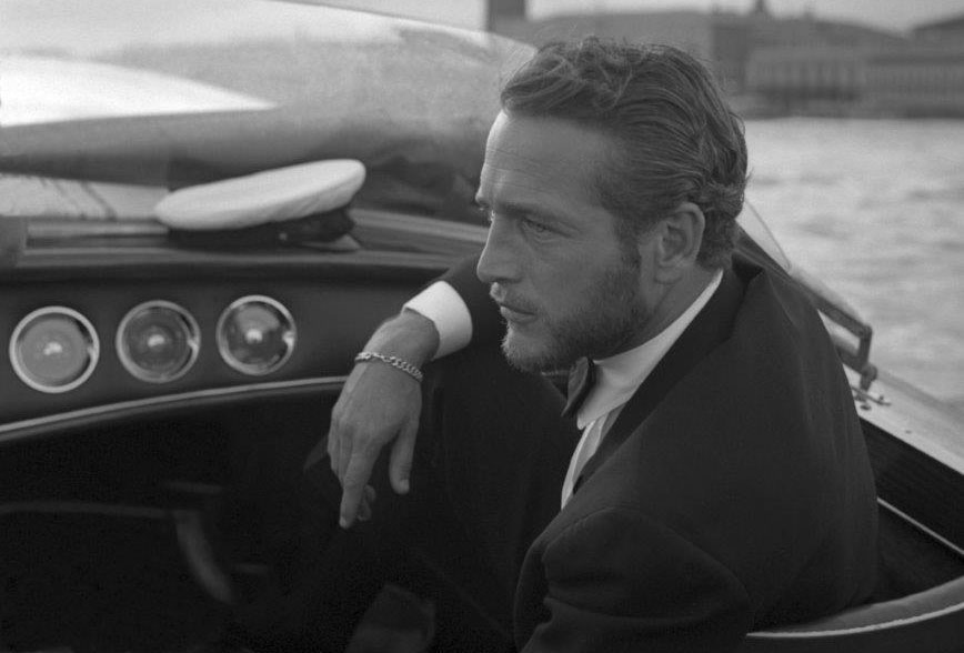 Style Icon Paul Newman driving a boat Venice